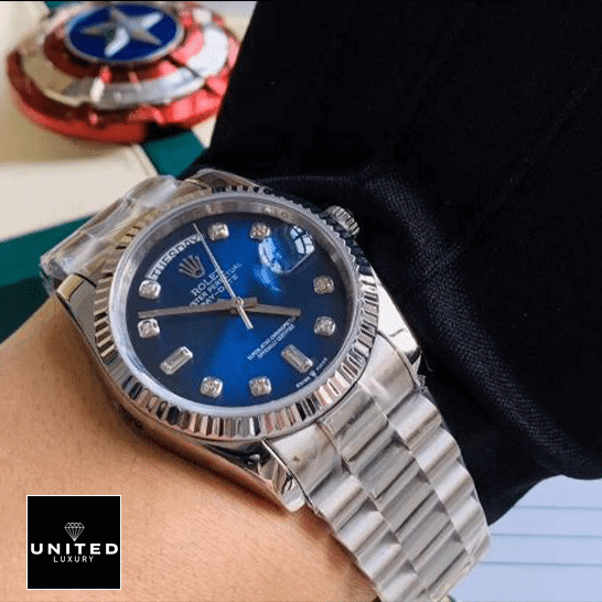 Rolex Day-Date 128239 Rolex Day-Date 36 7118-1200R-01 Replica on his arm
