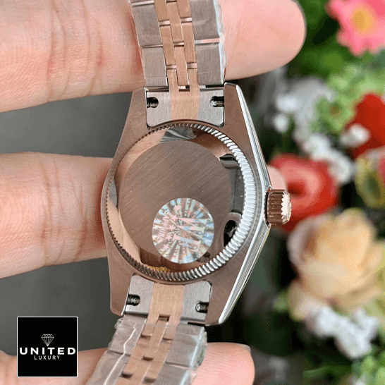 Rolex Datejust 278271 Rolex 278271 Stainless Steel Case Jubilee Replica on the hand & flowers