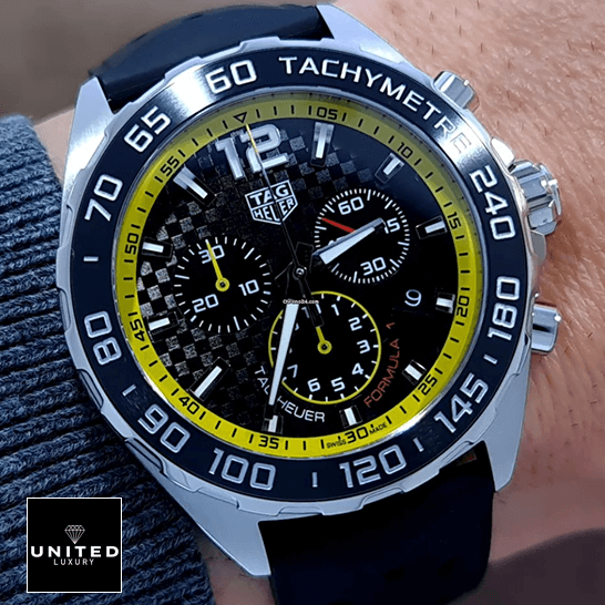 Tag Heuer Carrera Yellow Black Dial Replica on the man wrist