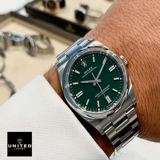 Rolex Datejust 126000 Oyster Perpetual Rolex Oyster Perpetual Green Dial 126000 Replica on his arm