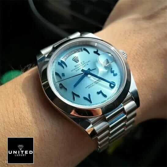 Rolex Day-Date 228206 Rolex DayDate 40 228206 Turquoise Dial Replica on his arm