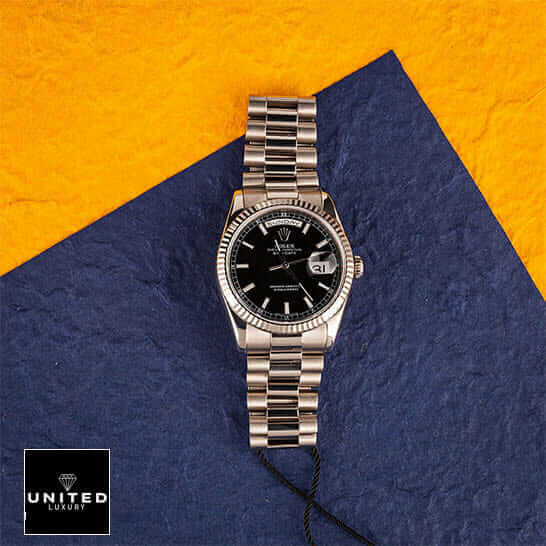 Rolex Day-Date 228238 Rolex Day-Date 118239 Replica Orange Blue Background