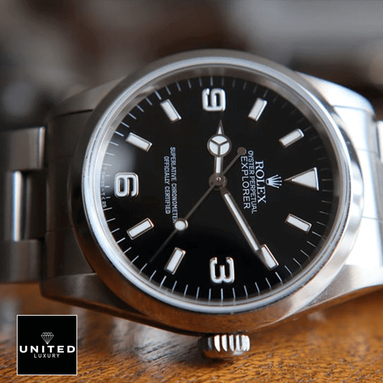 Rolex Explorer 124270 Rolex Explorer 124270 Stainless Steel Case and Bezel Replica on a wooden table