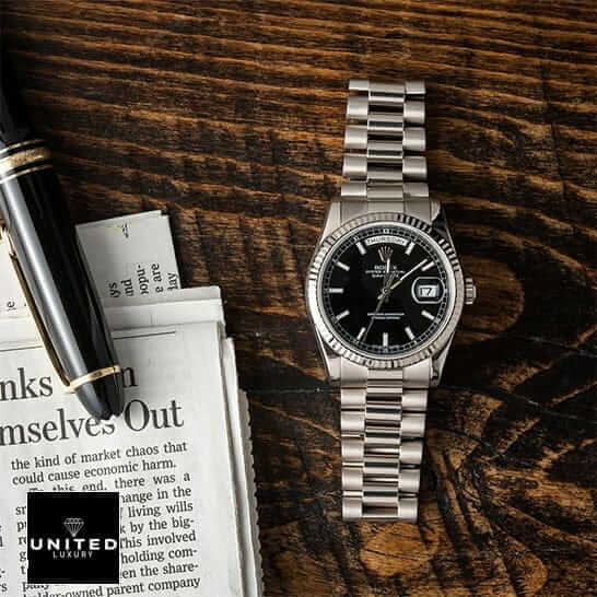 Rolex Day-Date 228238 Rolex Day-Date 118239 Replica on the table