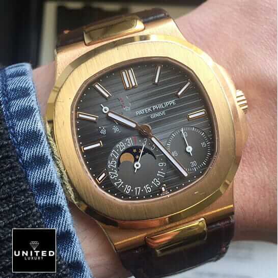 Patek Philippe Nautilus Black Dial Rose Gold Replica on the man wrist