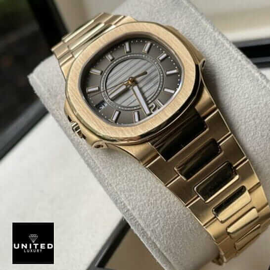Patek Philippe Nautilus 7011/1R Patek Philippe Black Dial Gold Bracelet Replica in the stand